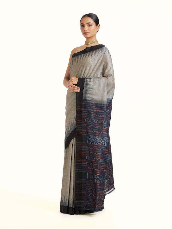 Side view of Green Tussar Silk Odisha Ikat Saree highlighting the detailed craftsmanship and elegant silhouette