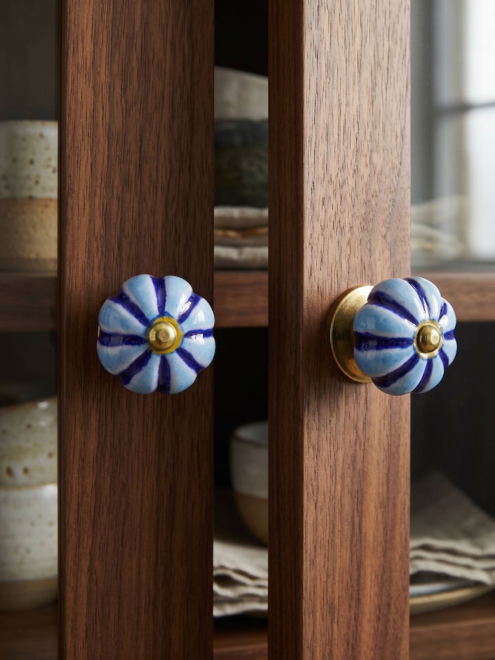 Styled view of Blue Pottery Round Rib Door Knob Set styled in a home setting