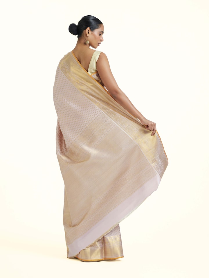 Back view of Light Pink Kancheepuram Silk Zari Saree emphasizing the overall design and fine details