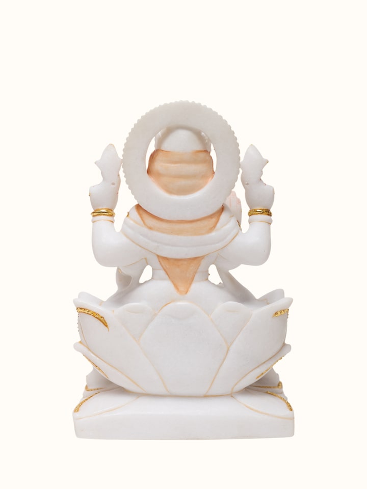 Back view of the Marble Carved Lakshmi Idol