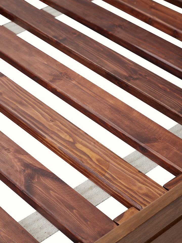 Front view of Carved Walnut Wood Poster Bed showing the front design and silhouette, from a different angle