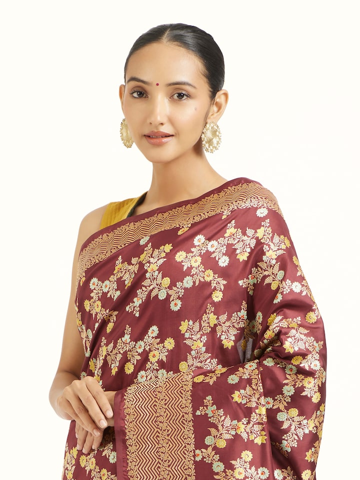 Angled view of Brown Banarasi Kadhwa Silk Saree revealing the depth of its color and intricate pattern