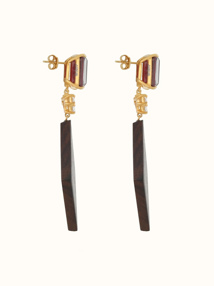 Side view of Tarkashi silver drop earrings showing detailed silverwork and traditional design