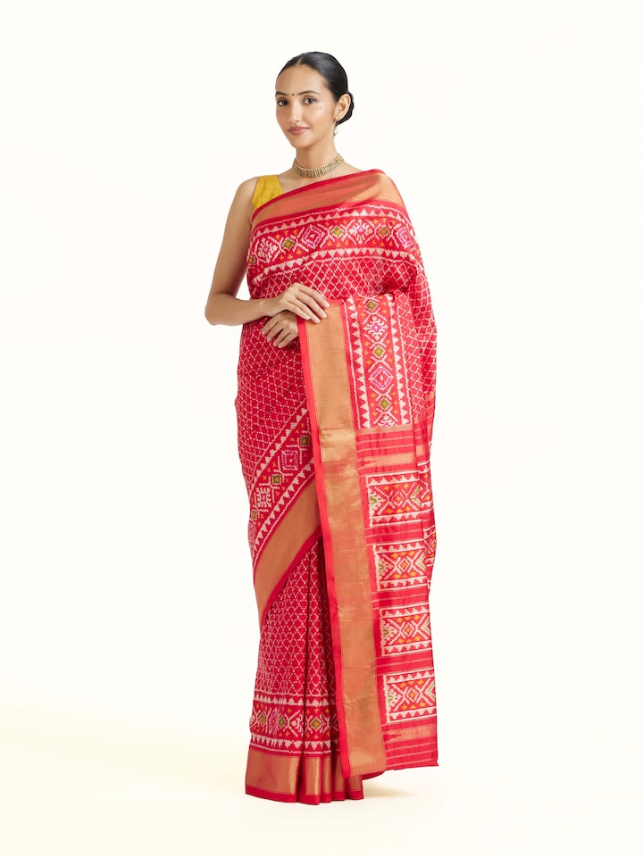 side view of red weft ikat silk saree drape
