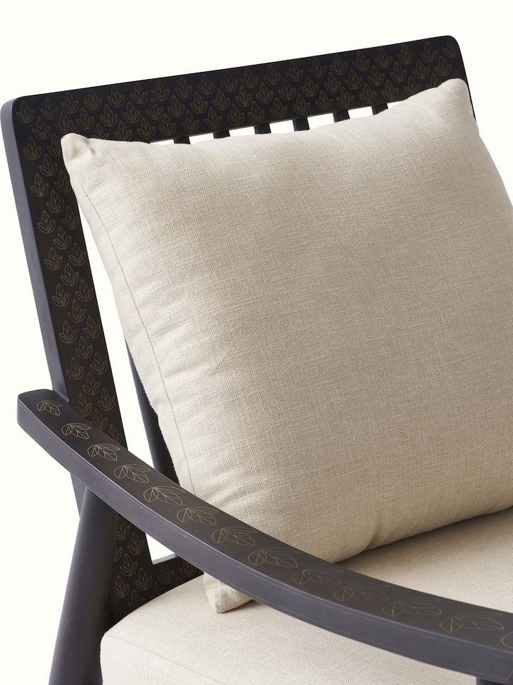 Another angle of the Sheesham wood and brass tarkashi rocking chair, focusing on the overall design and luxurious finish.