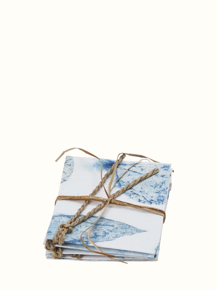 Angled view of Auroville Handmade Paper Gift Tags Blue (5 Pcs) showcasing the unique and eco-friendly gift tag design