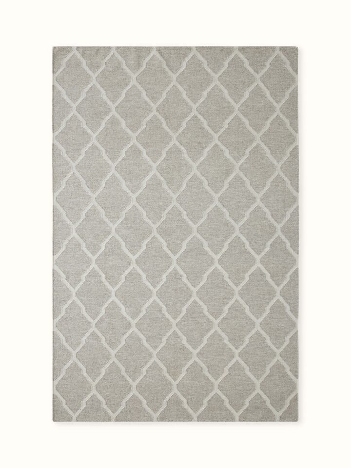 Front view showcasing the modern geometric pattern in grey and ivory melange wool