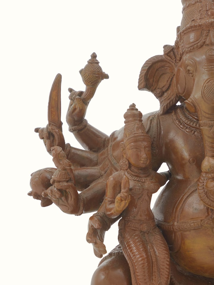 Side view of Spectacular Bronze Casting Ganesha with Siddhi Buddhi Idol by Swadesh emphasizing its intricate detailing and artistic flair.