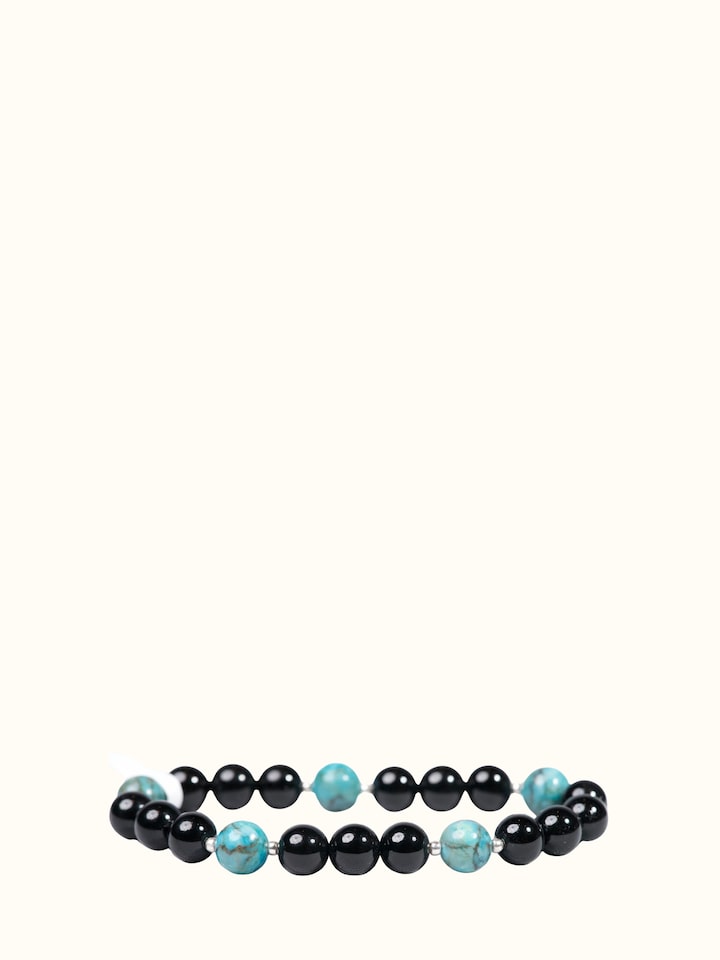 Detail view of Gemstone Black Onyx & Turquoise Silver Bracelet highlighting the beadwork and stone detail