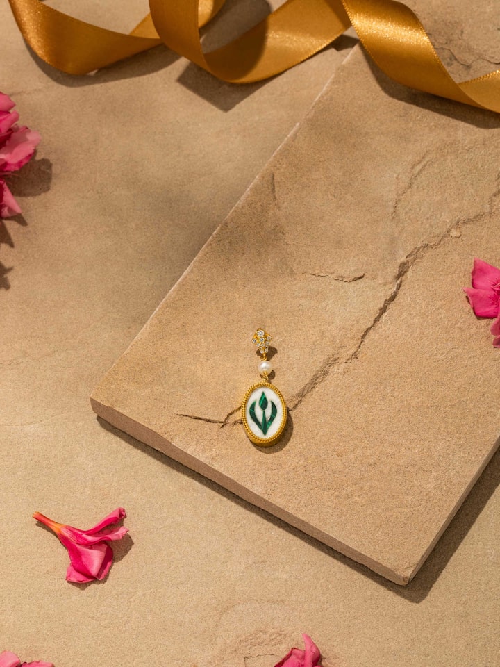 Overhead view highlighting the pendant's shape and ornamental layout