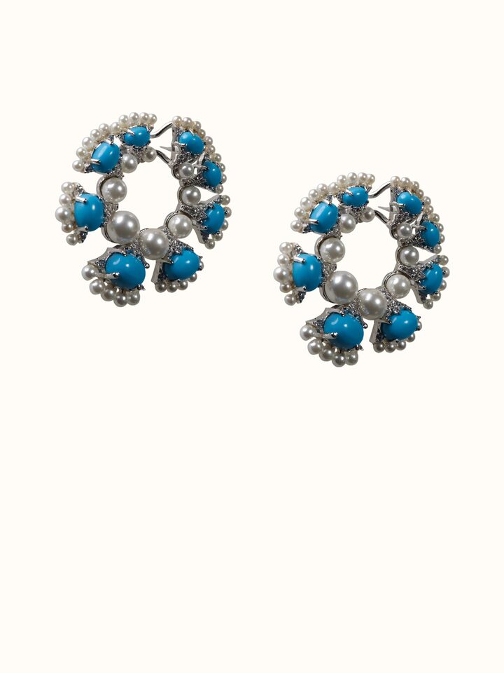 Close-up view of Silver Smithing Stud Earrings highlighting the stone setting and metalwork detail