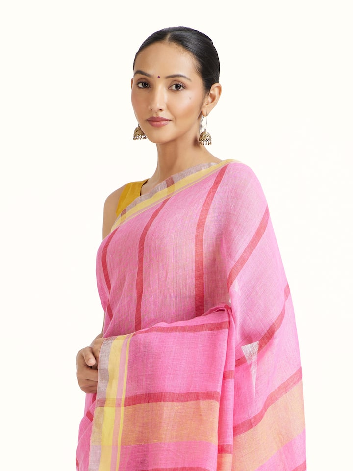 Angled view of the Pink Linen Striped Saree