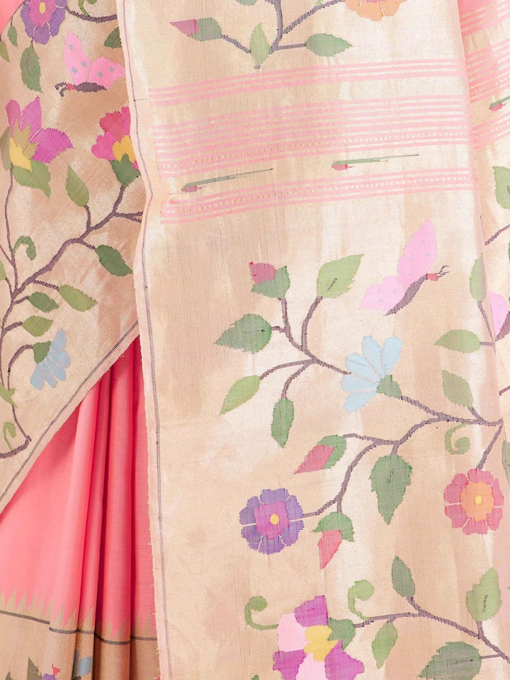 Detail view of pink silk Paithani saree showing silk texture and zari work