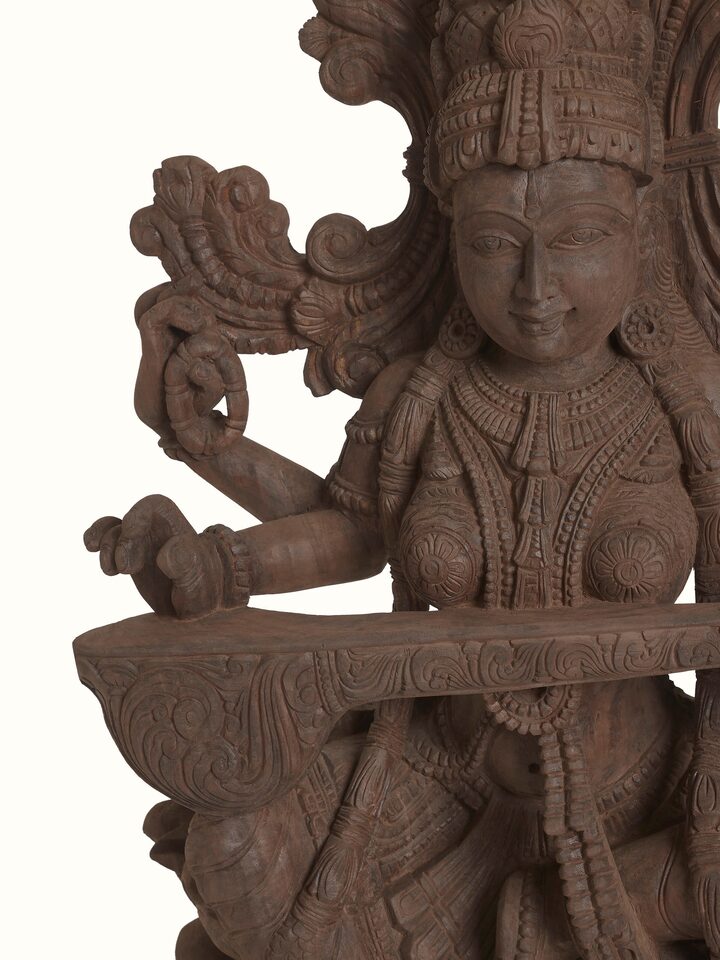 Detailed view of the Wood Carved Sitting Saraswati Idol