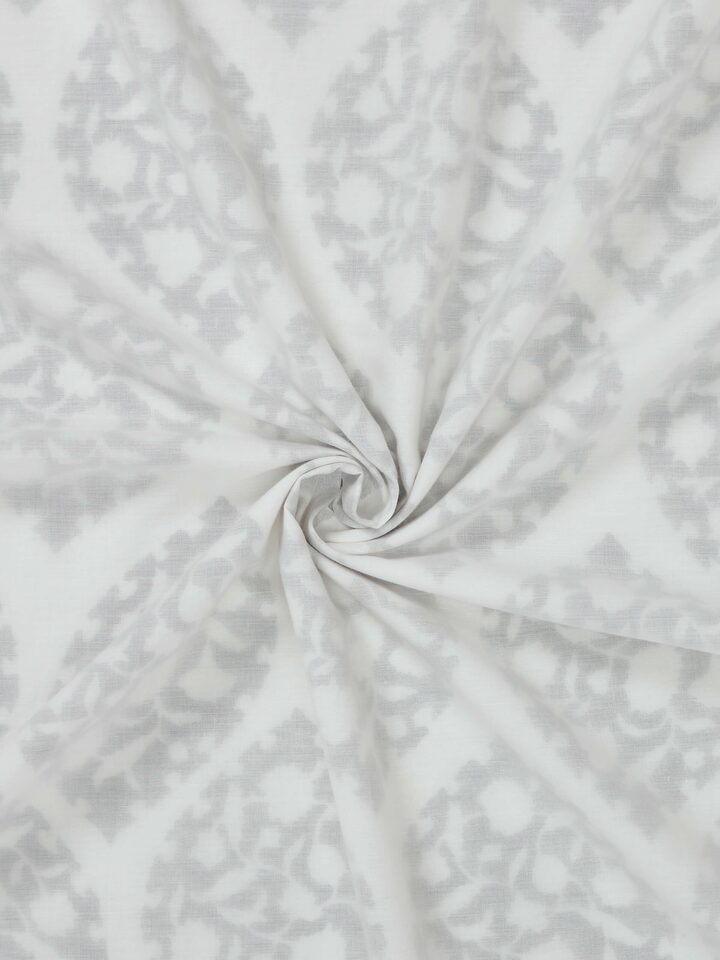 Detail shot capturing fine cotton weave and ogee block print detailing on Mihrab grey double dohar