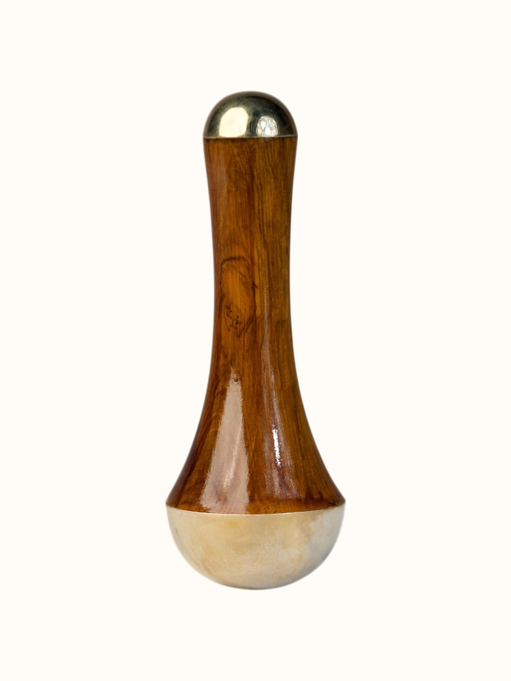 Front view of the Swadesh Kansa Wand Ayurvedic Facial and Body Massage Tool