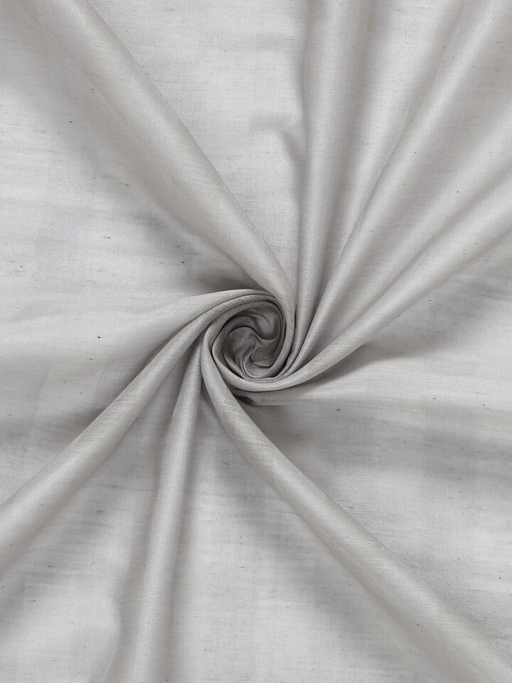 An angled view of the Pragya Maheshwari Sheer Curtain with wide grey stripes, capturing the blend of traditional Maheshwari weaving and modern design aesthetics.