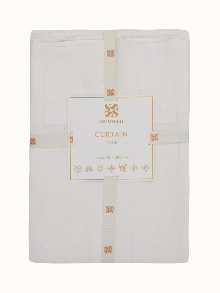 Close-up of Kalpanama Curtain fabric, emphasizing the handloom finish and subtle buti pattern.