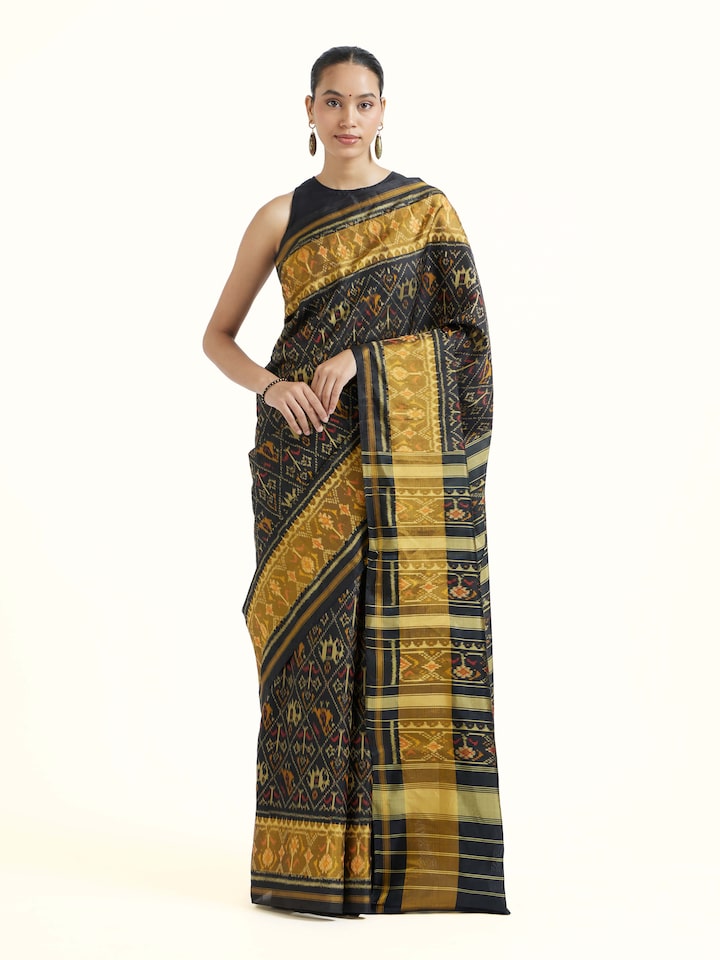 Front view of Rajkot Patola Ikat Saree showcasing its traditional craftsmanship and design