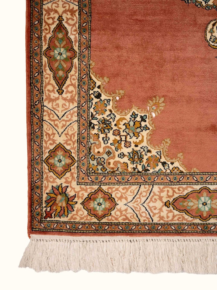 Detail view of Traditional Persian Rust Opan Kashmir Silk Hand-Knotted Carpet highlighting the intricate pattern and pile texture, from a different...