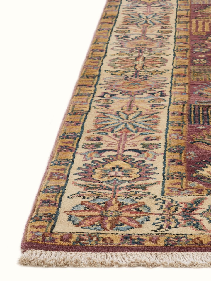 Detailed view of Ziegler Traditional Light Majenta Jaipur Wool Hand-Knotted Carpet, focusing on the texture and design elements.