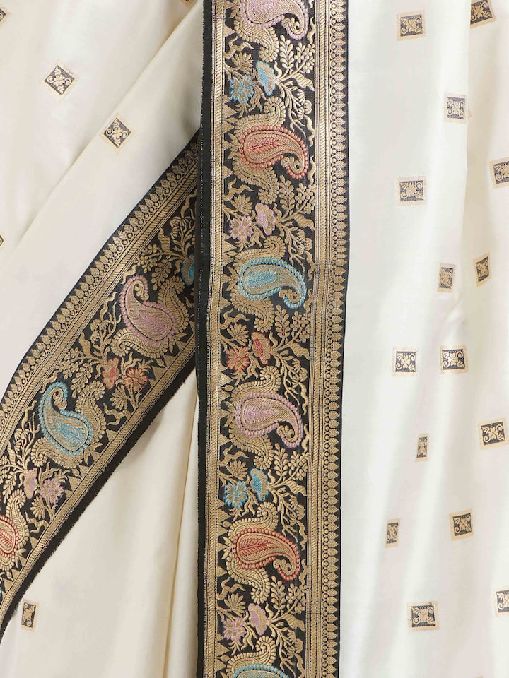 Detailed view of Off-white Banarasi Kadhwa Silk Saree focusing on the fine craftsmanship and texture
