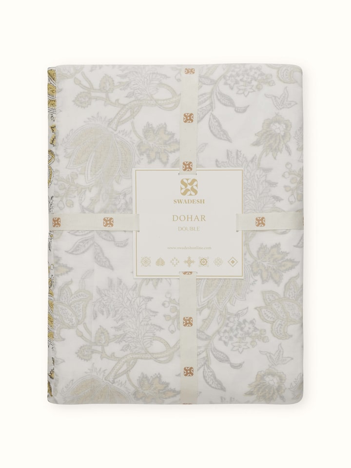 Back view of Kairavam yellow floral dohar – reversible cotton quilt design.