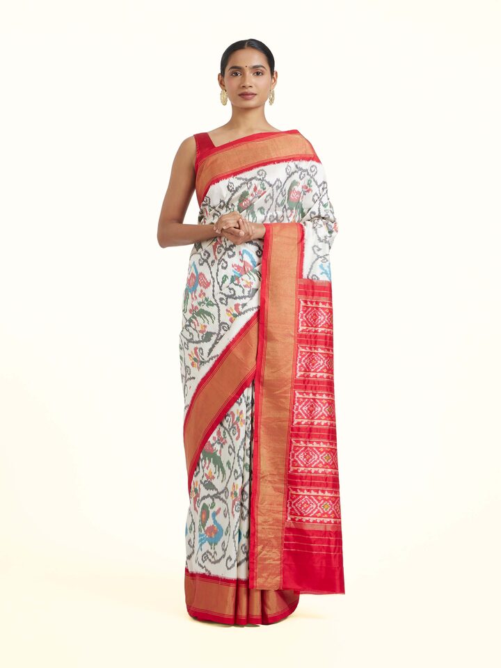 Front view of Off-White Pochampally Ikat Silk Saree showing the full drape and pallu design
