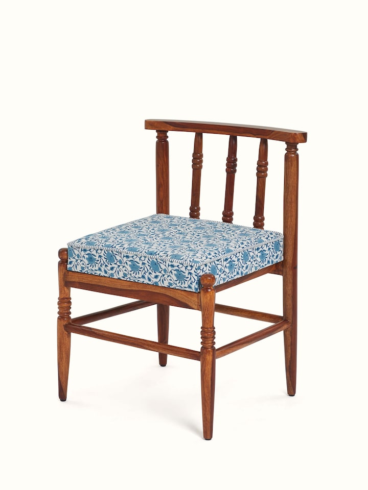 angled view of upholstered sheesham study chair