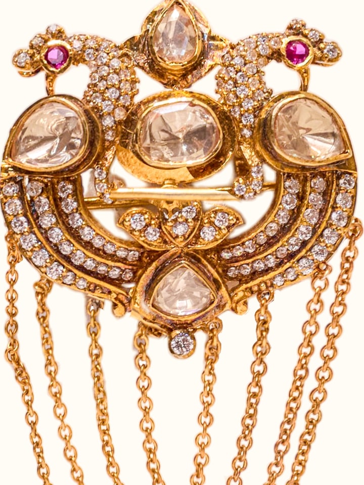 detail view of silver smithing brooch pin pattern