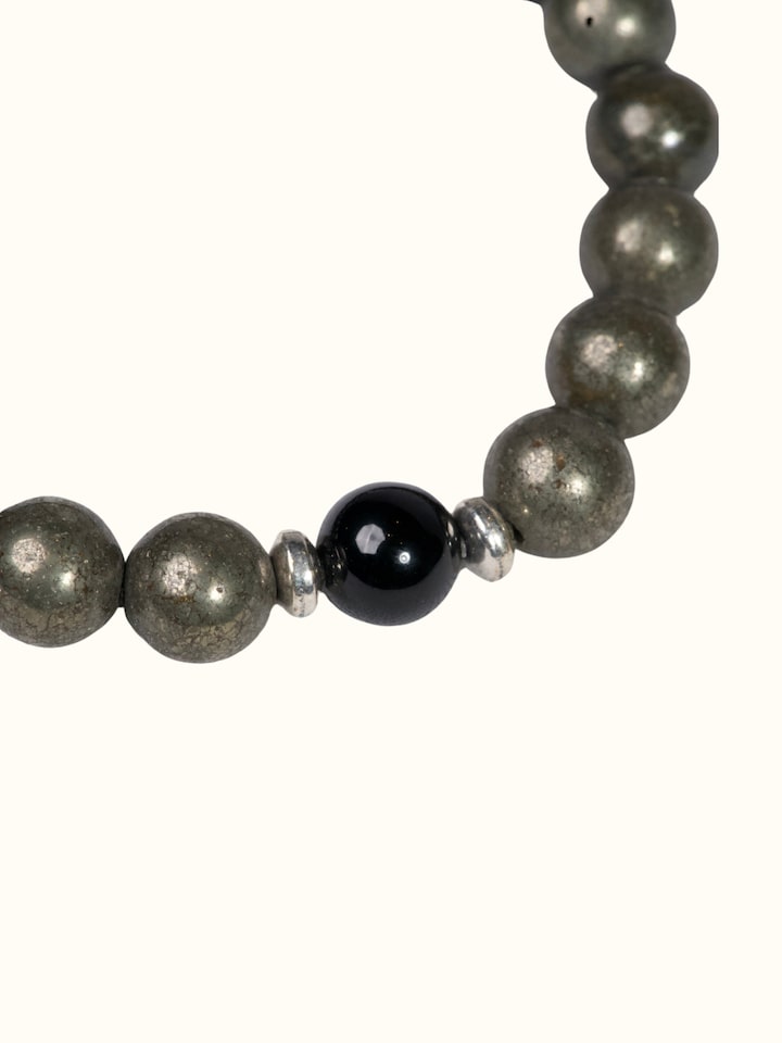 Close-up view of Gemstone Pyrite & Black Onyx Bead Silver Bracelet highlighting the beadwork and stone detail
