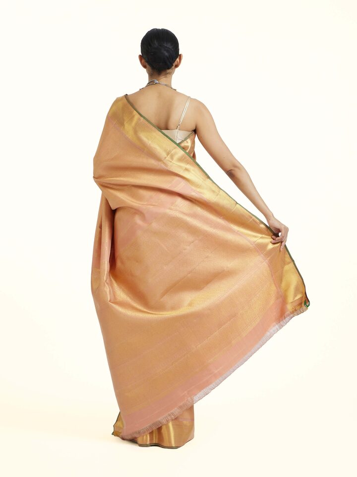 Back view of Pink Kancheepuram Silk Zari Saree emphasizing the overall design and fine details
