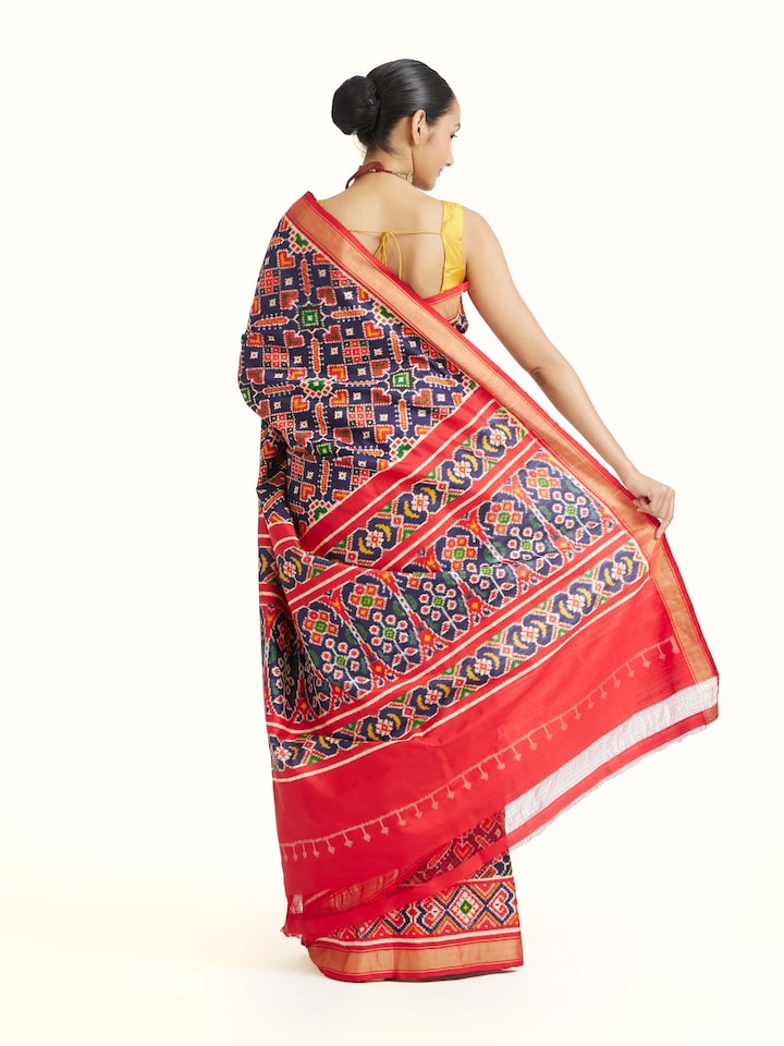 back view of navy double ikat silk saree