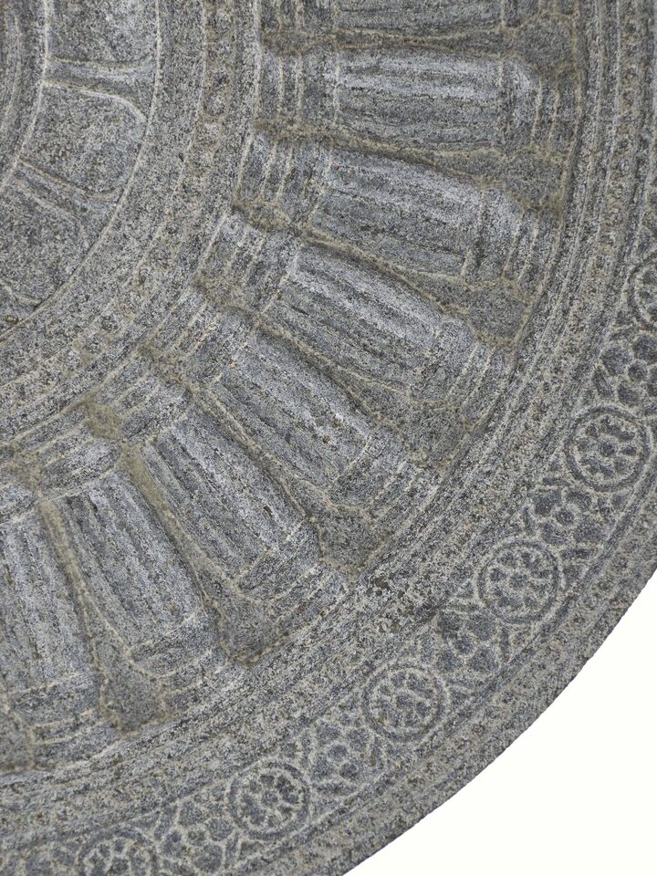 Detail view of the Stone Carved Rath Chakra Sculpture