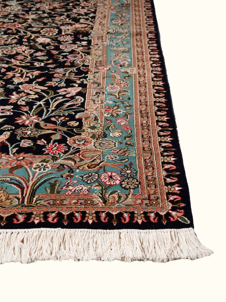 Close-up view of Traditional Persian Navy Floral Allover Kashmir Silk Hand-Knotted Carpet highlighting the hand-knotted weave and motif detail