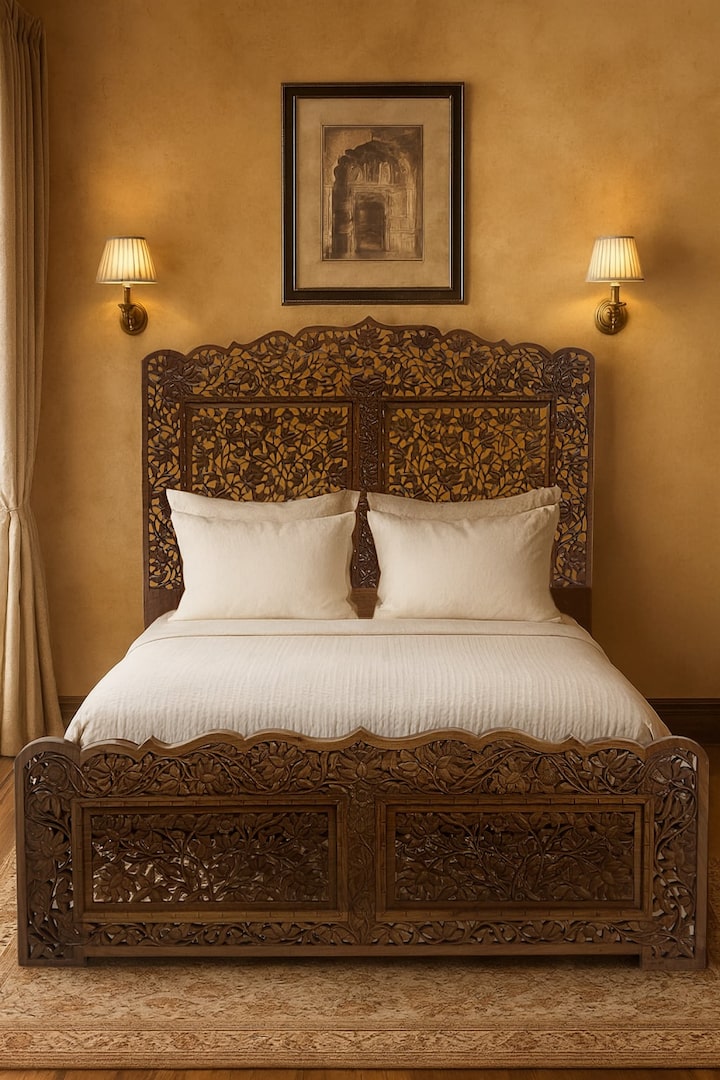 Carved Walnut Wood Queen-size Bed styled in a bedroom setting with white bedding