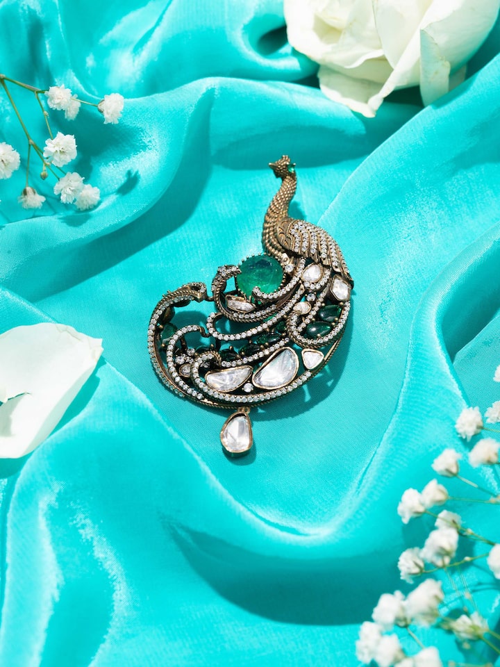 Styled detail view of Silver Smithing Brooch Pin pinned onto fabric, shown in another styled shot