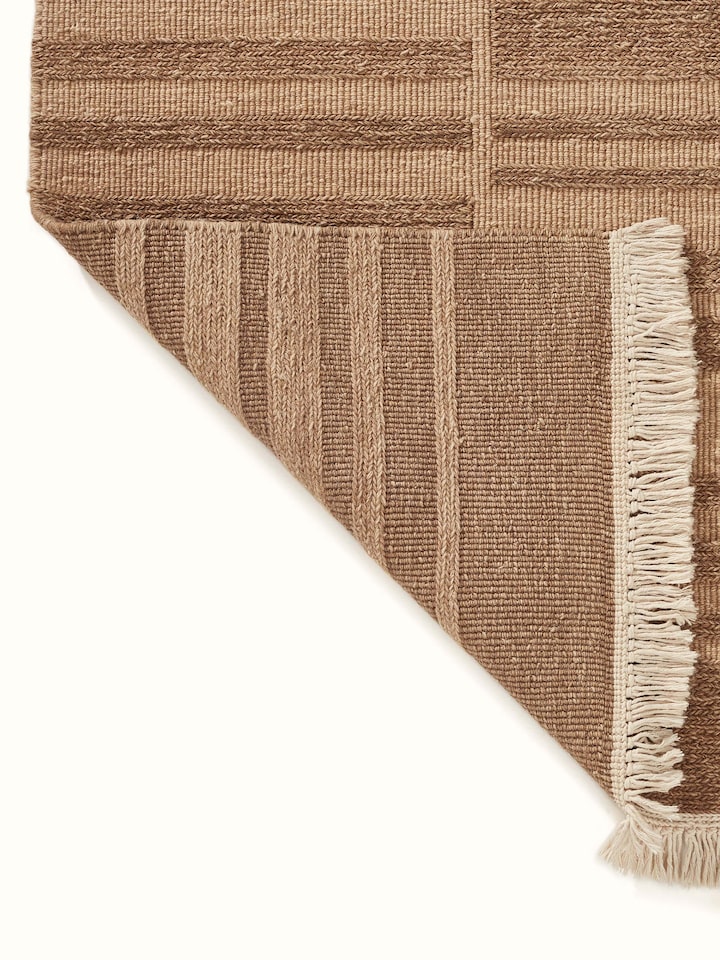 Back view illustrating the sturdy hand-knotted construction and finishing of the Bhadohi rug