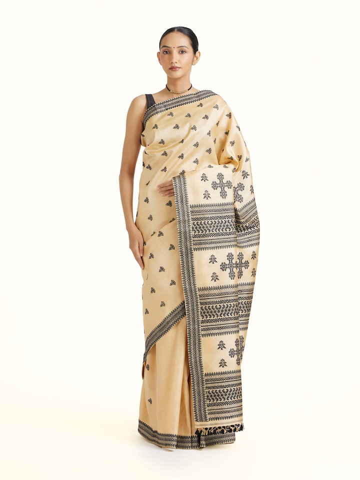 Front view of Beige Tussar Silk Saree showcasing its traditional craftsmanship and design