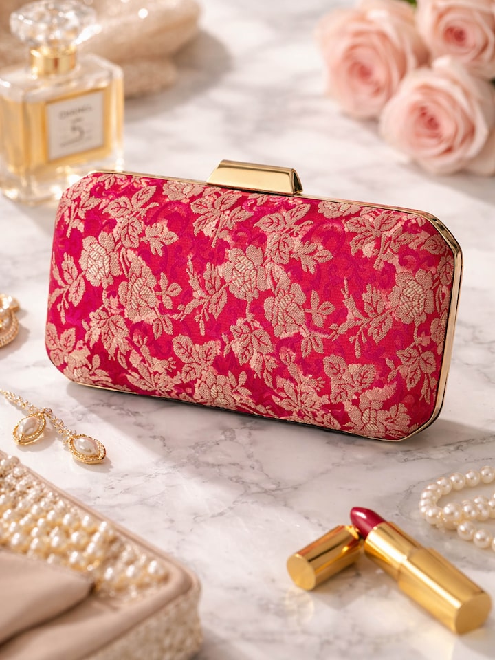 Styled view of Pink Banarasi Silk Box Clutch showing the bag styled with an outfit