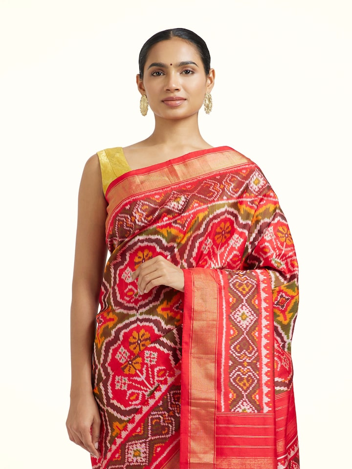 Angled view of the Red Mulberry Silk Pochampally Ikat Handloom Saree