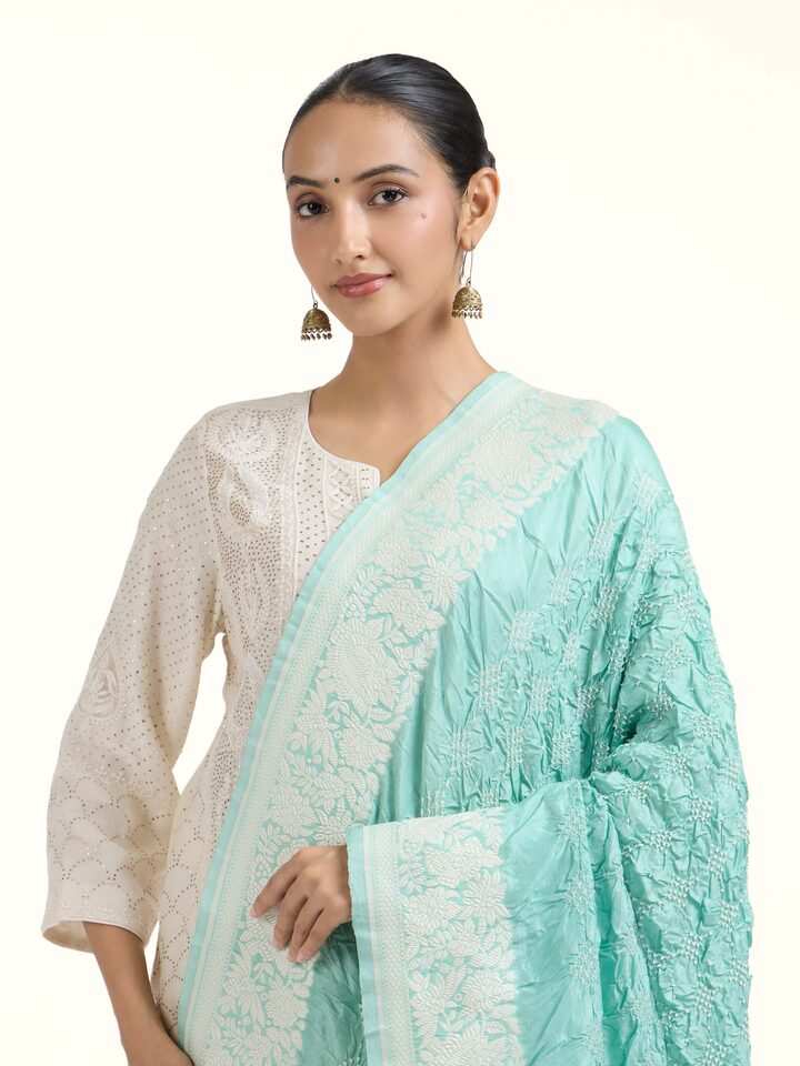 Angled view of Sea Green Bandhani Tie & Dye Dupatta revealing the depth of its color and intricate pattern