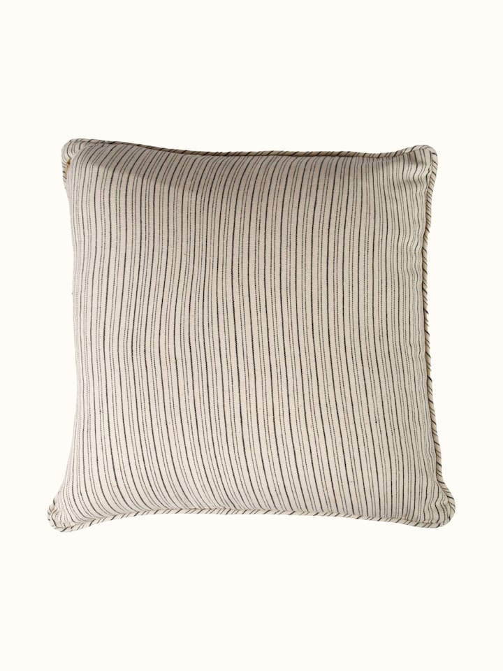 Folk geo hand embroidered buti cushion cover, back view with fabric texture