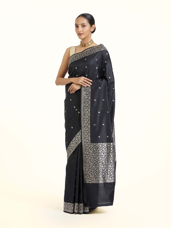 Side view of Black Banarasi Kadhwa Silk Saree highlighting the detailed craftsmanship and elegant silhouette