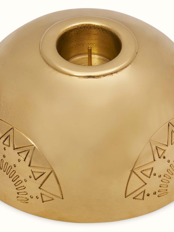 Angled view of Brass Candle Stand Green Color, showing the classic design and color contrast