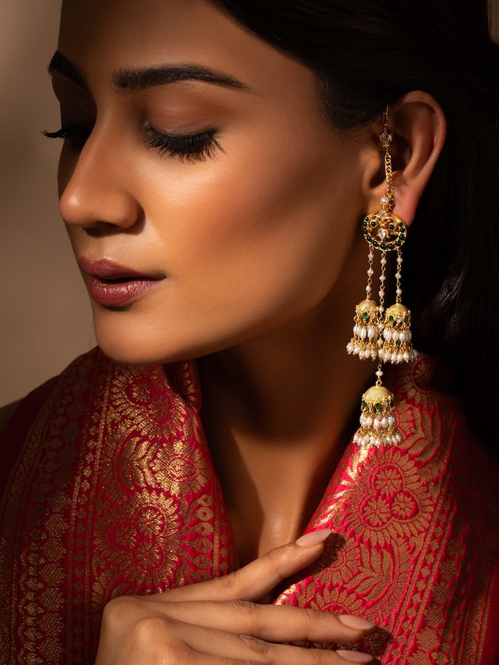 Close-up side view highlighting intricate design on Guttapusalu silver drop earrings