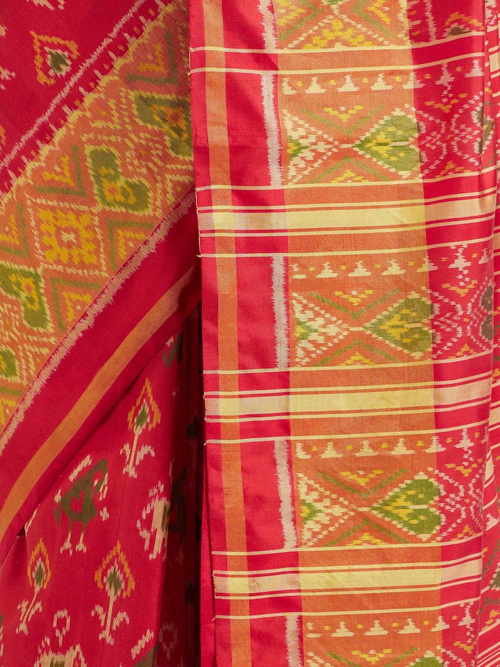Detailed view of Rajkot Patola Ikat Saree focusing on the fine craftsmanship and texture