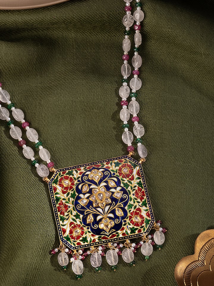 Lifestyle view of Jaipur Meenakari pendant and chain paired with festive attire, reflecting Rajasthani heritage.