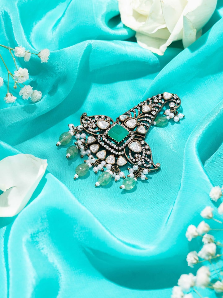 Styled detail view of Silver Smithing Brooch Pin pinned onto fabric, shown in an alternate styled shot