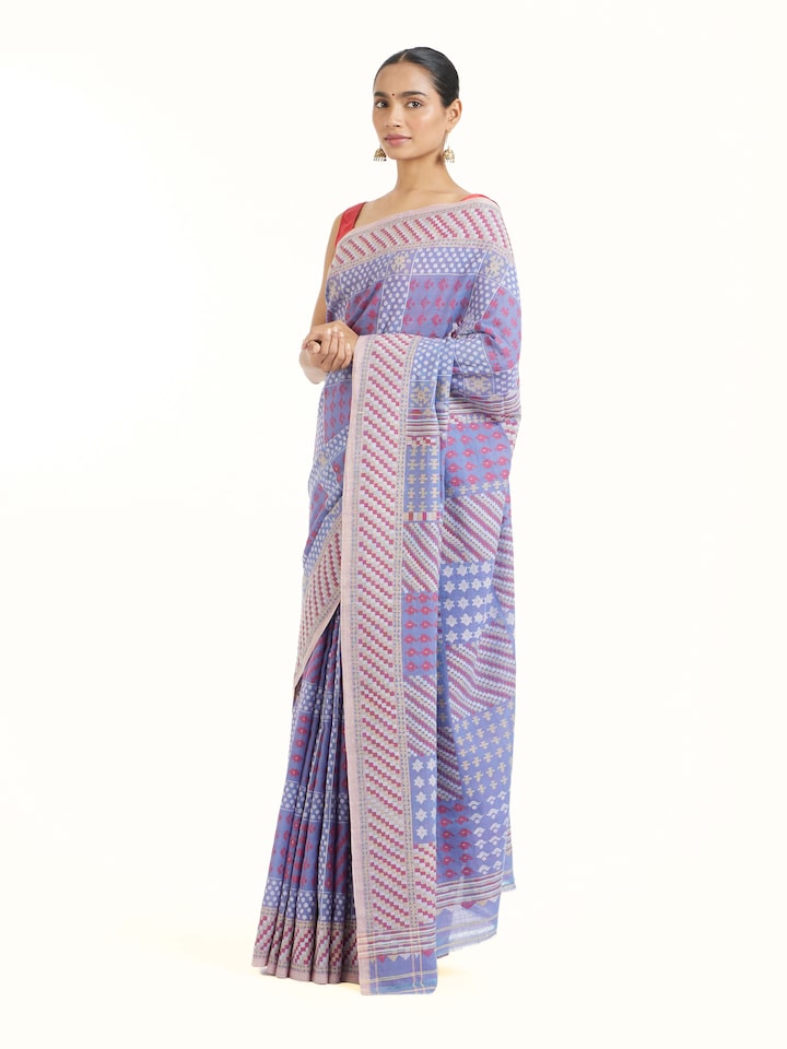 Side view of beige cotton Bengal Jamdani saree with soft drape and light texture